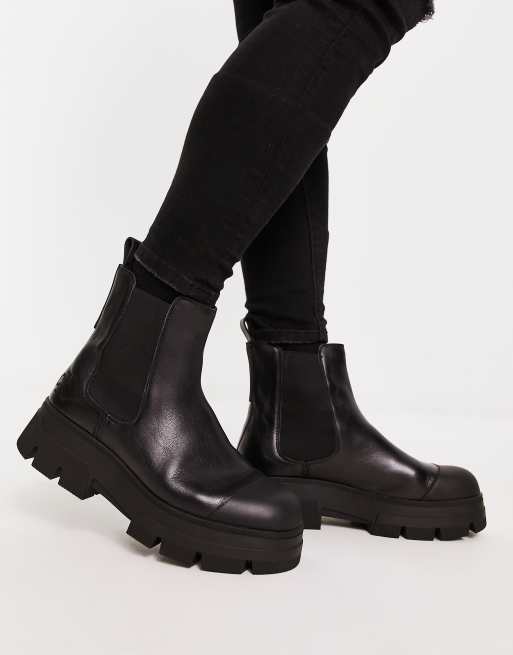 Calvin klein black chelsea on sale boots