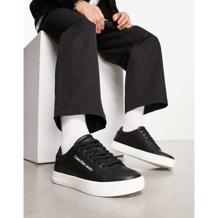 Calvin klein black on sale slip on sneakers