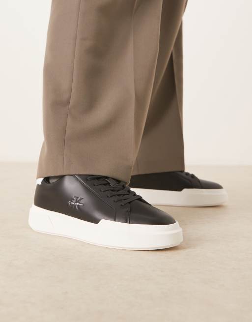Calvin Klein Jeans chunky cupsole lace up sneakers with monogram logo in black and white