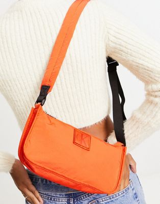 Calvin Klein Jeans city nylon shoulder bag in coral orange