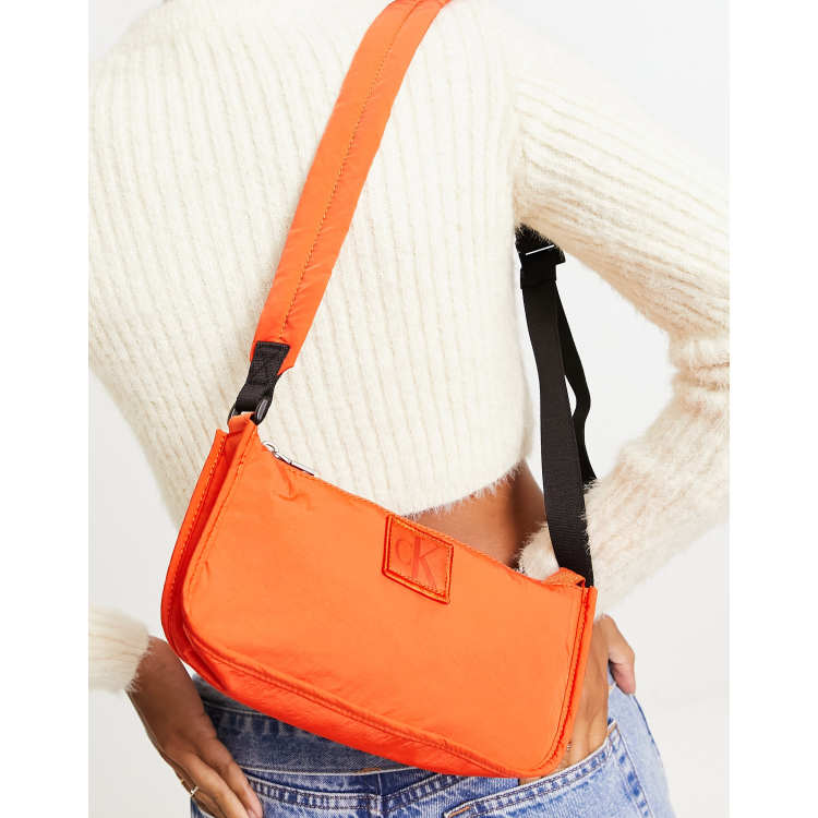Calvin Klein Jeans city nylon shoulder bag in coral orange