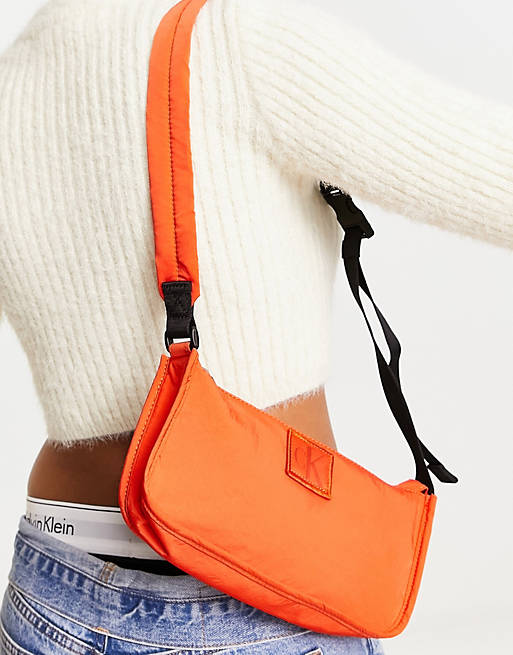 Calvin Klein Jeans city nylon shoulder bag in coral orange | ASOS