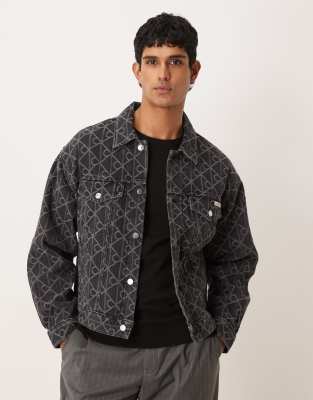 Calvin Klein Jeans Calvin Klein Jeans CK emblem jacquard print trucker denim jacket in black