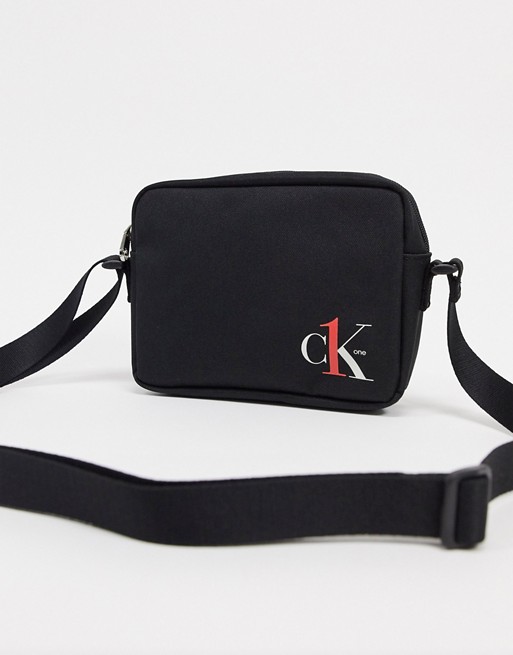 Calvin Klein Jeans CK1 logo camera bag in black