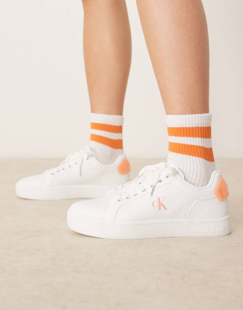 Calvin Klein Jeans classic cupsole sneakers in white and orange - view 1
