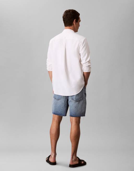 Calvin Klein Jeans classic denim shorts in mid wash blue, 4 of 4