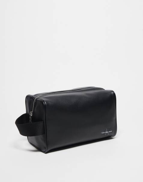 Calvin Klein Jeans classic logo washbag in black - view 1