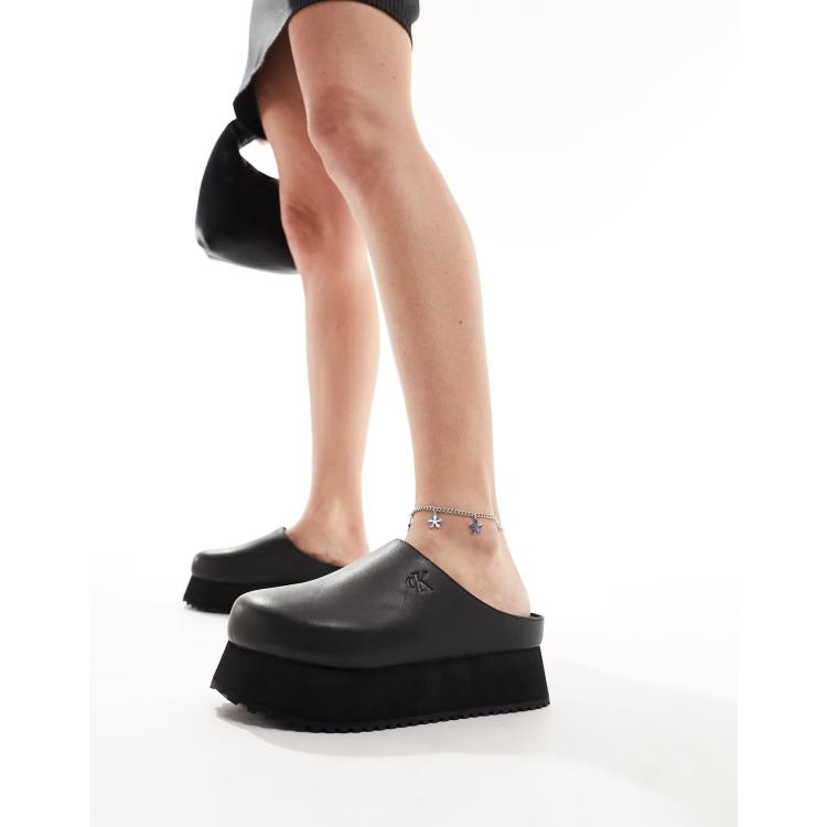 Calvin Klein Jeans closed toe flatform mules in black ASOS