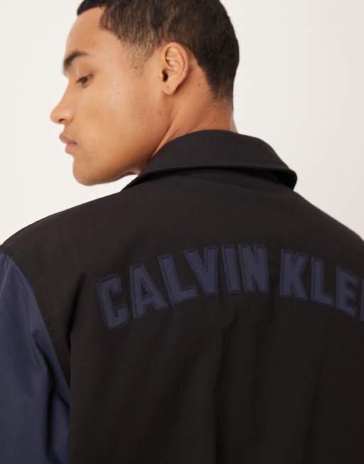 Calvin Klein Jeans – College-Bomberjacke aus Baumwolle in Schwarz und Blau, 5 von 5