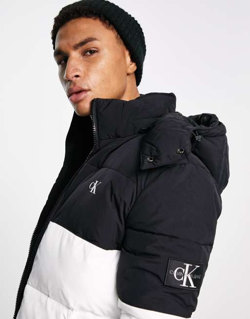 Calvin Klein Jeans color block hooded puffer jacket in black/white | ASOS