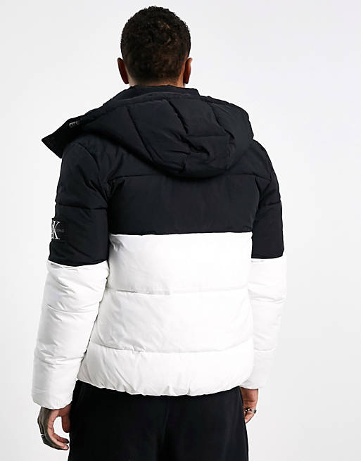 Calvin Klein Jeans colourblock hooded puffer jacket in black/white | ASOS