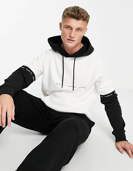 Introducir 98+ imagen calvin klein hoodie black and white
