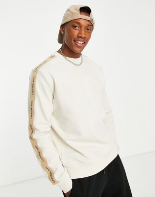 Calvin Klein Jeans contrast tape crew neck sweatshirt in stone
