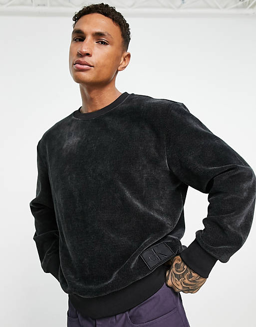 Calvin Klein Jeans corduroy sweatshirt in black | ASOS