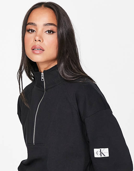 Calvin Klein Jeans cotton badge logo half zip sweatshirt in black - BLACK |  ASOS
