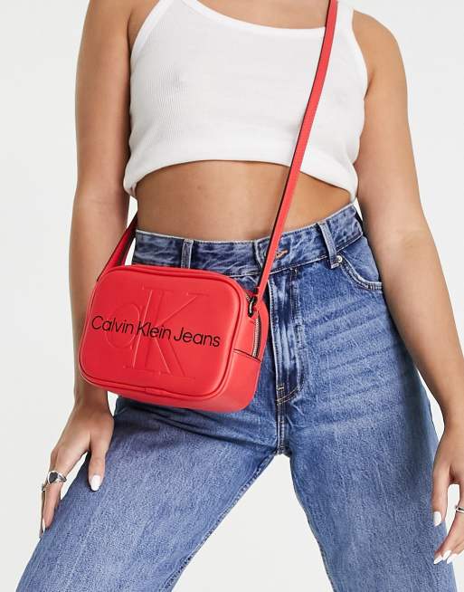 Calvin Klein Jeans cotton monogram logo sculpted camera bag in red