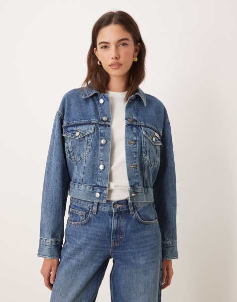 Calvin Klein Jeans cropped denim trucker jacket in mid wash blue 