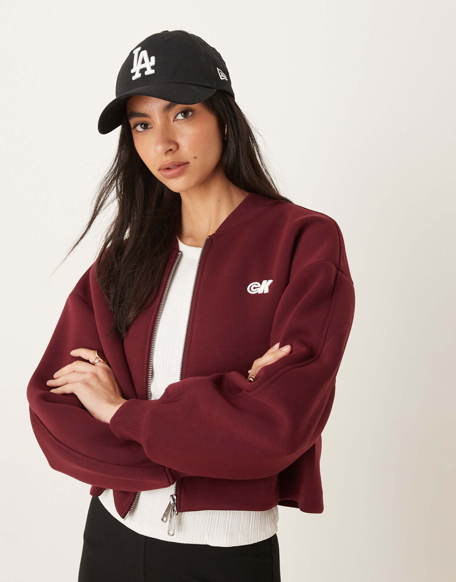 calvin klein jeans cropped double zip jacket in burgundy scuba-style fabric