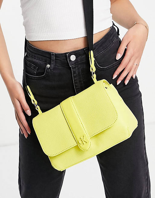 Calvin Klein Jeans crossbody handbag in yellow | ASOS
