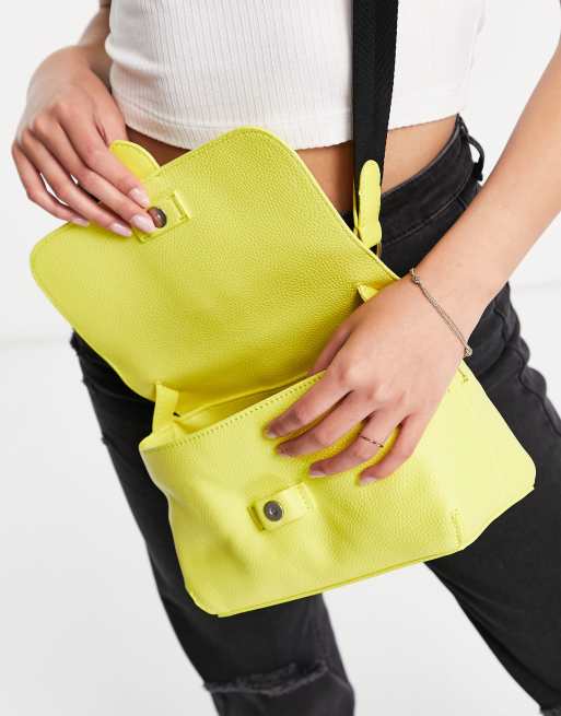 Calvin Klein Jeans crossbody handbag in yellow | ASOS