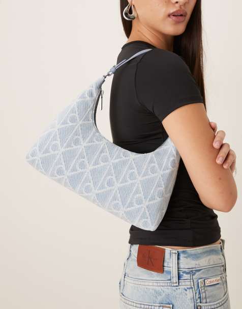 Calvin Klein Jeans denim logo print shoulder bag in light wash - view 1