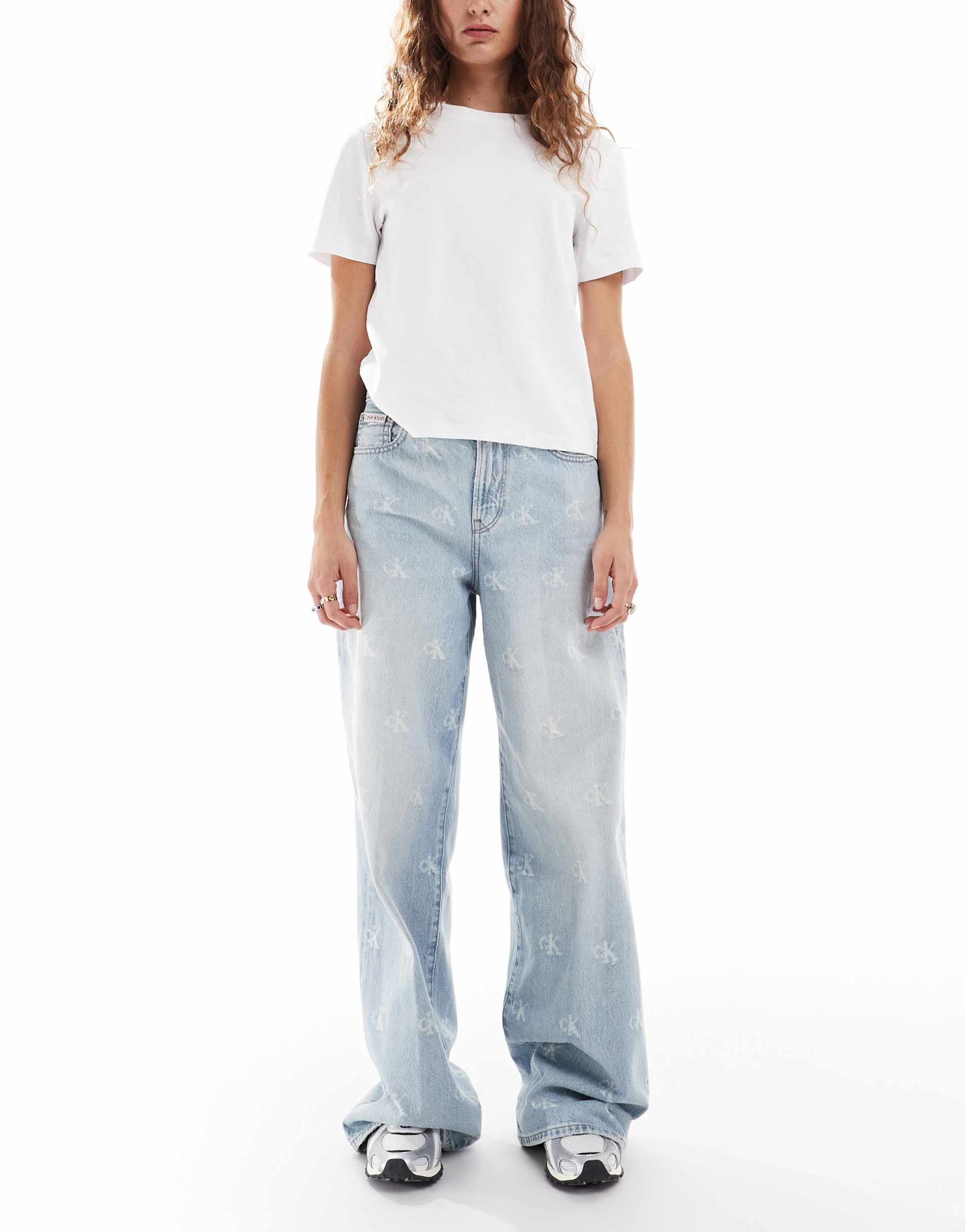 calvin klein jeans distressed logo print wide leg jeans in light wash