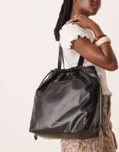 ☆ ☆ Women's CKJ Drawstring Shoulder Bag Black 4 Calvin Klein Jeans drawstring crossbody bag in black | ASOS