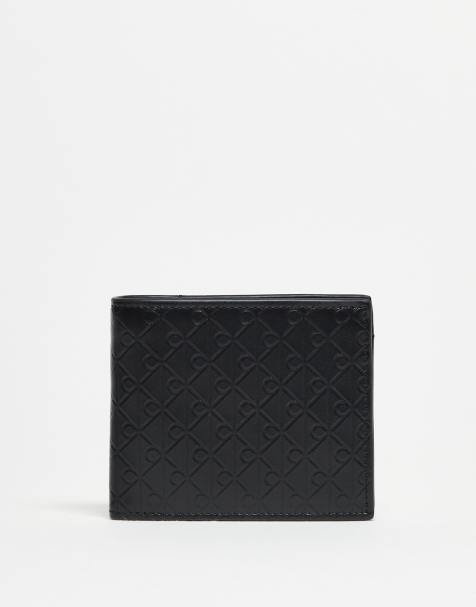 Calvin Klein Jeans emblem bi-fold wallet in black - view 1