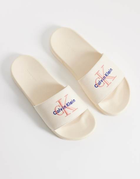 Calvin Klein Jeans essential logo slider in cream - view 1