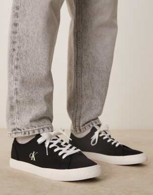 essential vulcanized canvas sneakers in black and white