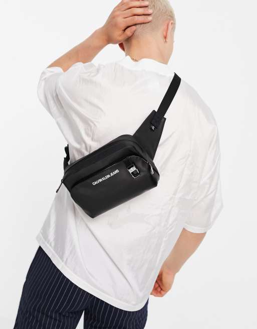 Calvin Klein Jeans faux leather bum bag with panel logo in black | ASOS