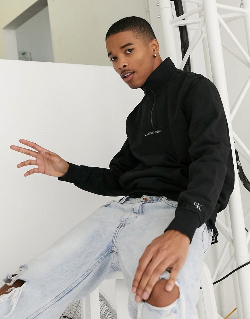 Calvin Klein Jeans - Felpa nera con logo sul petto e zip corta-Nero