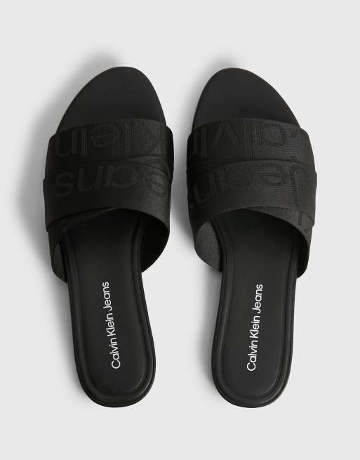 Calvin Klein Jeans flat sliders in black ASOS