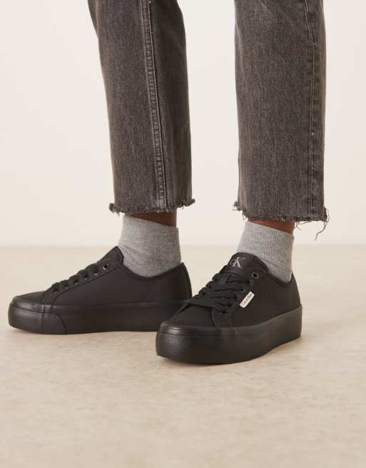 Calvin Klein Jeans flatform lace up trainers in black