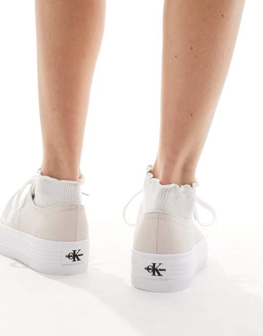 Calvin Klein Jeans flatform monogram logo sneakers in pale