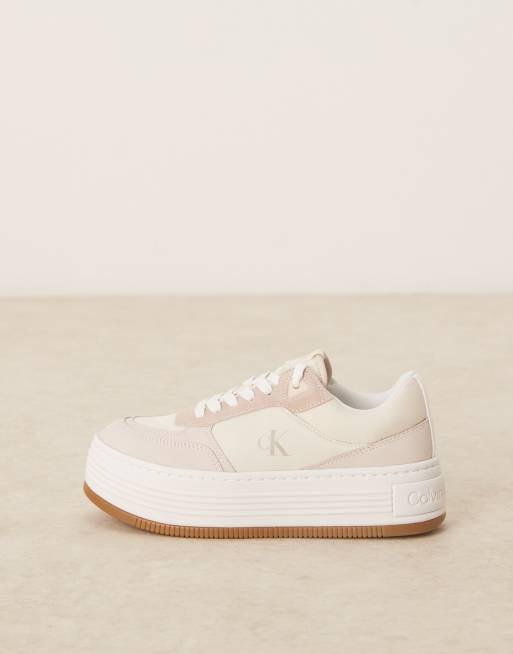 Calvin Klein Jeans flatform trainers in off white with gum sole