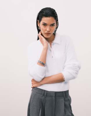 Calvin Klein Jeans - Flauschiger Polo-Pullover in Hellblau