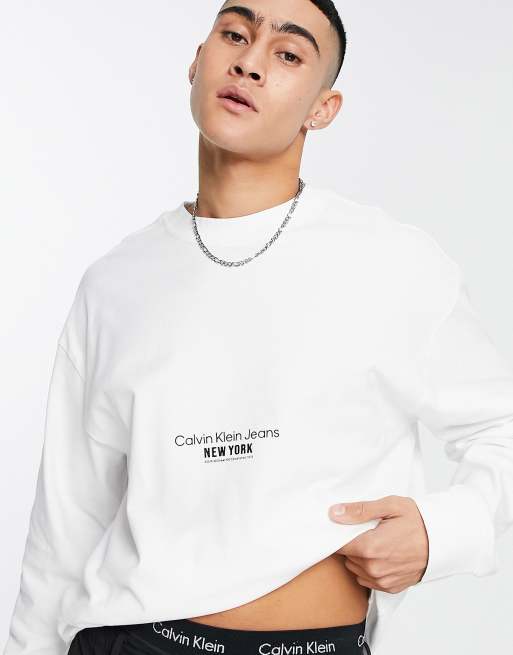 Calvin Klein Jeans floral graphic logo long sleeve t shirt in white