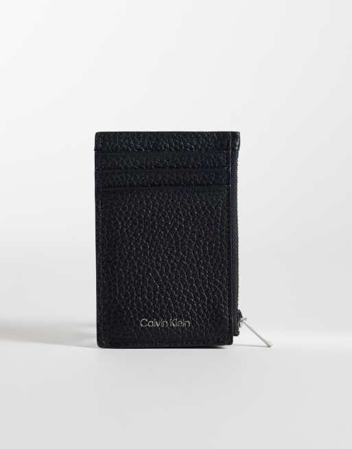 Calvin Klein Jeans foil embossed zip card holder in black | ASOS