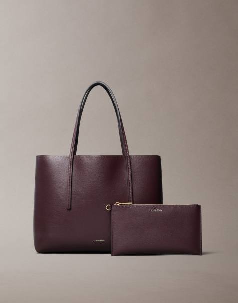 Calvin Klein Jeans foil logo small tote bag and purse set in burgundy - view 1