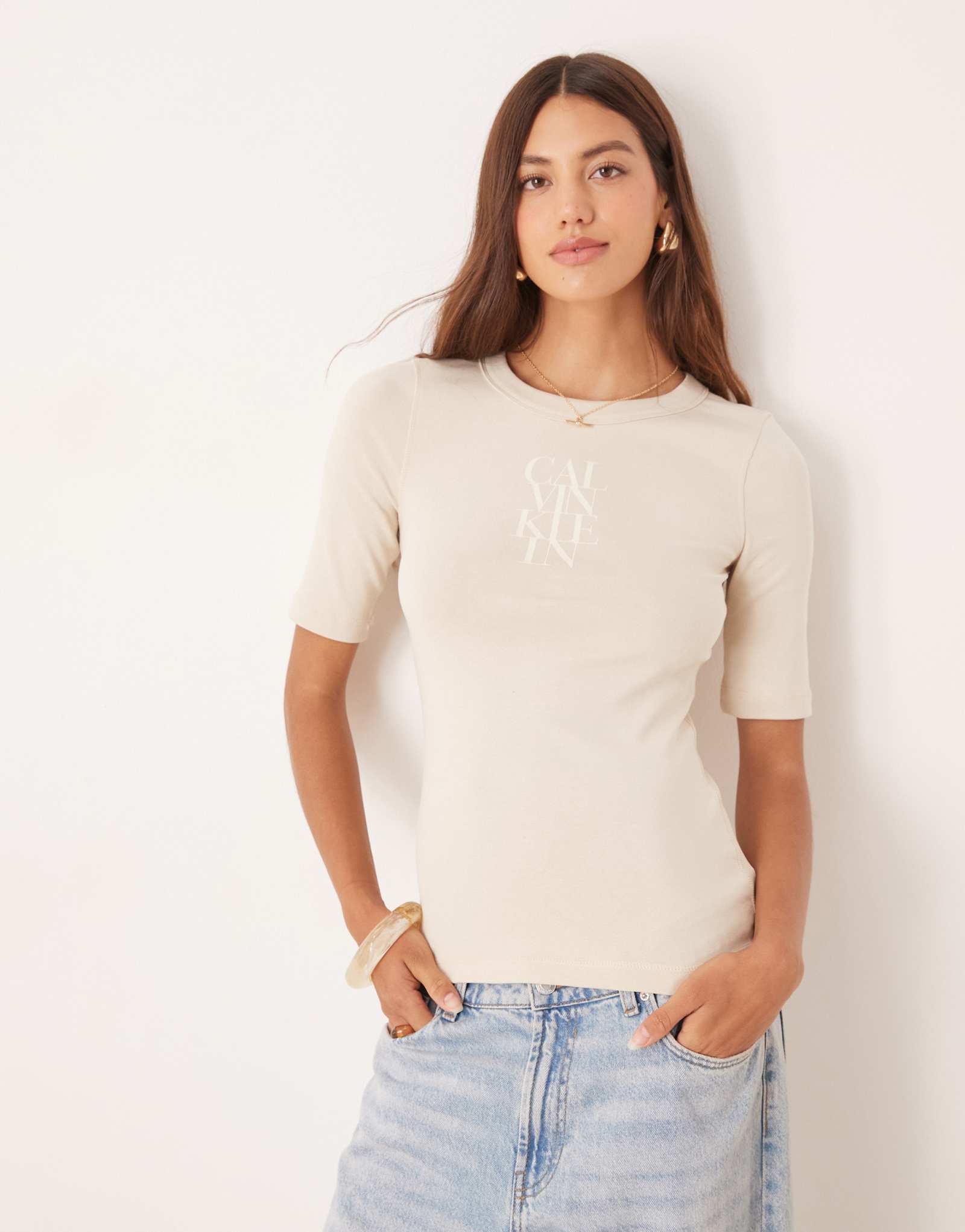 Бежевый топ в рубчик с логотипом Calvin Klein Jeans