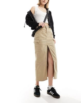 Calvin Klein Jeans front split denim maxi skirt in tan - ASOS Price Checker
