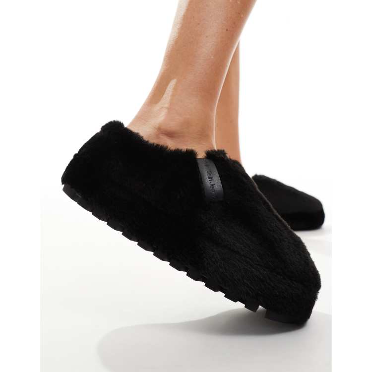 Calvin Klein Jeans fur mule slippers in black ASOS