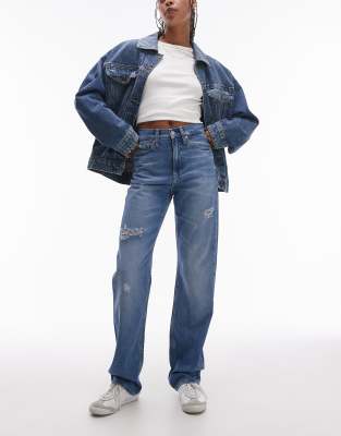 Calvin Klein Jeans - Gerade geschnittene, zerrissene Jeans mit hohem Bund in heller Waschung-Blau