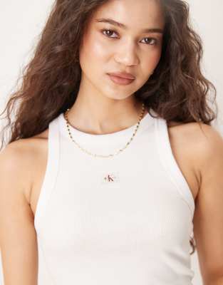 Calvin Klein Jeans - Geripptes Tanktop in Weiß mit Logo-Etikett aus Webstoff
