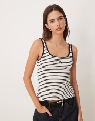 Calvin Klein Jeans - Geripptes Tanktop mit schwarzen Streifen, U-Ausschnitt und Monogramm-Logo