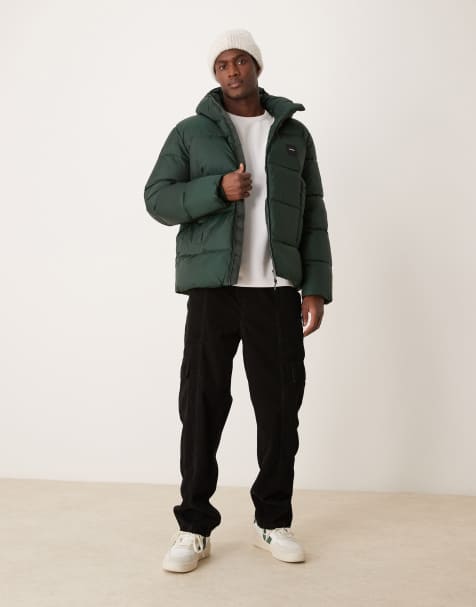 Calvin Klein Jeans – Gesteppte Pufferjacke in Mittelgrün mit Kapuze - view 1