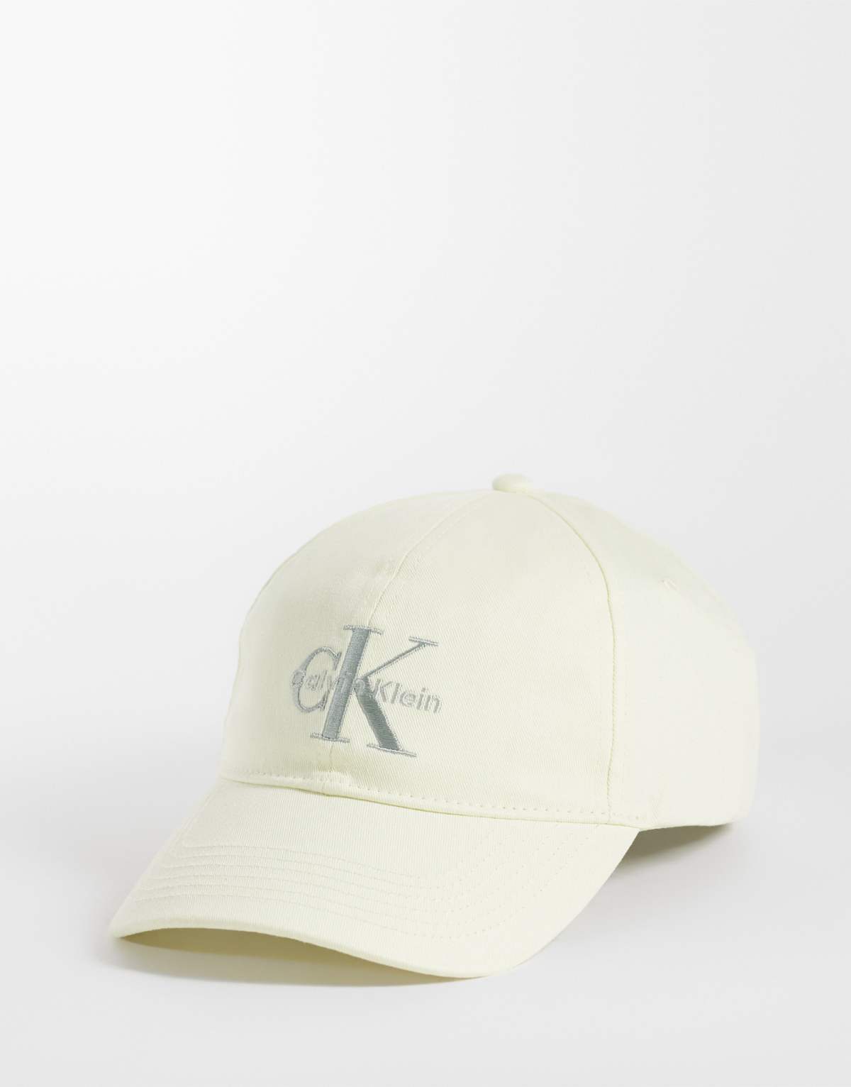 Calvin Klein Jeans - Gorra de béisbol color crema con logo bordado plateado