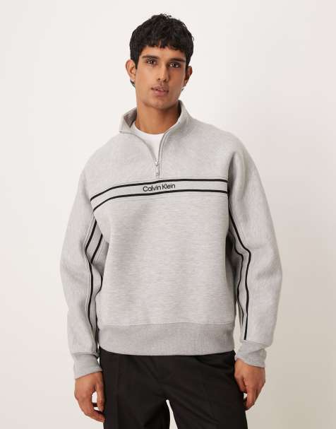 Calvin Klein Jeans – Grå topp med randig design, kvartslång dragkedja och centrerad logga på bröstet - view 1