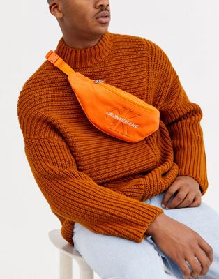 Calvin Klein Jeans - Heuptasje met monogram in oranje